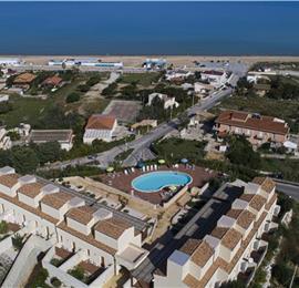 2 bedroom seaside apartments with shared pool, sleeps 4-5